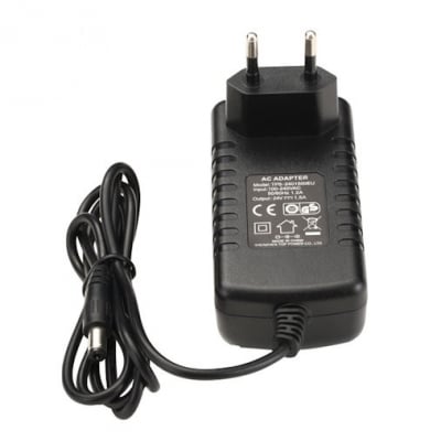 Захранване . Импулсен aдаптeр от 220V на 12VDC / 1A, 1210